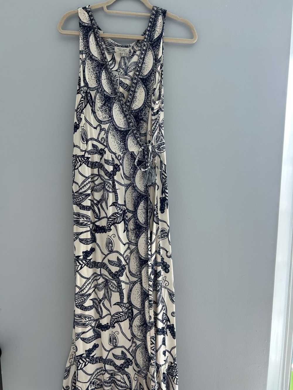 Sleeveless Cream Maxi Dress with navy Botanical Print. Beautiful embroidery